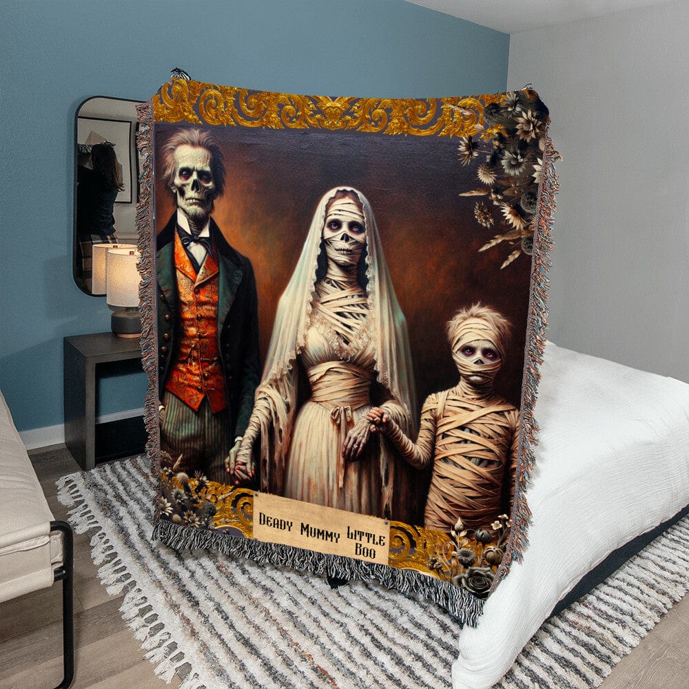 Gothic Halloween Blanket - Deady Mummy Little Boo Spooky Woven Cotton Throw with a zombie dad mummy mom and child mummy zombie in a vintage gold frame with dead flowers in the corners