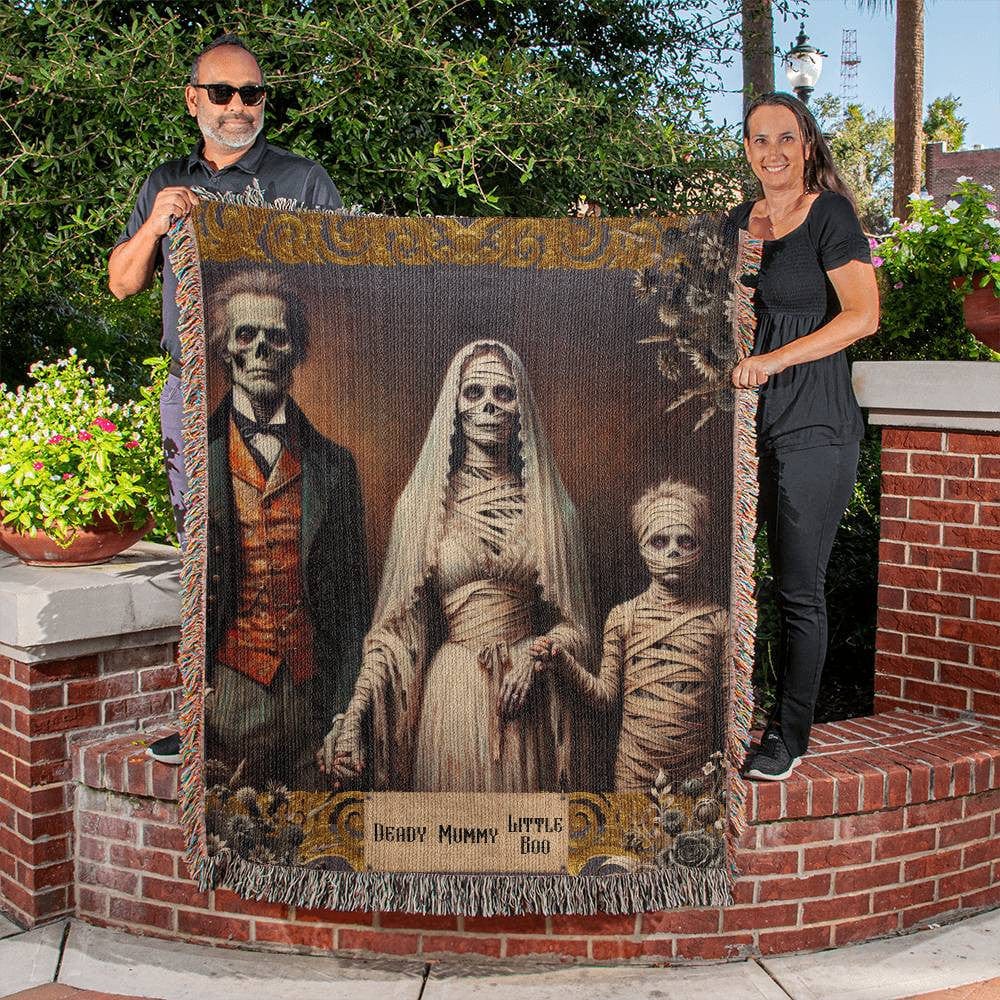 Gothic Halloween Blanket - Deady Mummy Little Boo Spooky Woven Cotton Throw with a zombie dad mummy mom and child mummy zombie in a vintage gold frame with dead flowers in the corners